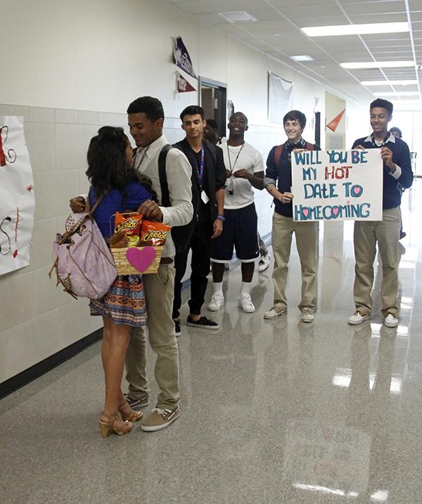 Tameren Clark asked Maria Felipa to Up-N-Coming with a surprise meeting in the hallway and a little help from his friends. 