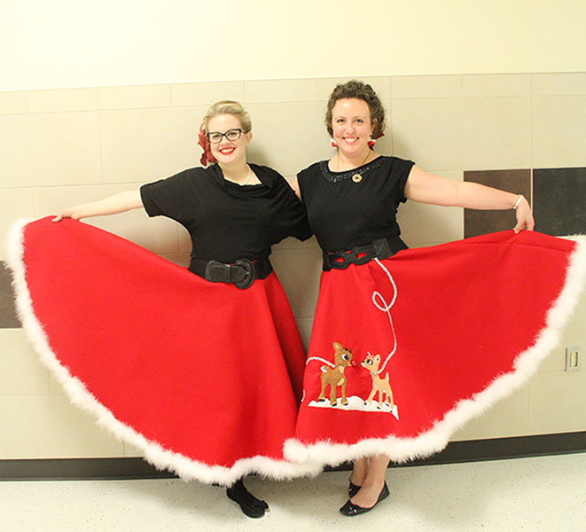 Dorie Tucker and Kacey Conroy show off their holiday skirts. Photo by Lasha Kelley-Little.