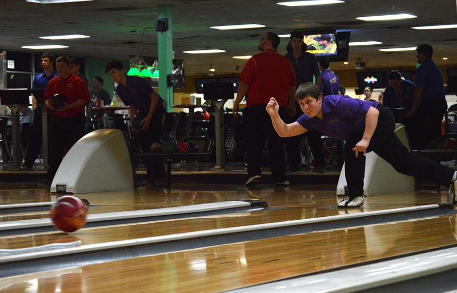 Sophomore JV Team Captain Zech Templin warms up before the bowling team's last match of the season Jan. 24. The varsity bowling team finished off the season undefeated.  Photo by Jezza Bull-Briones.