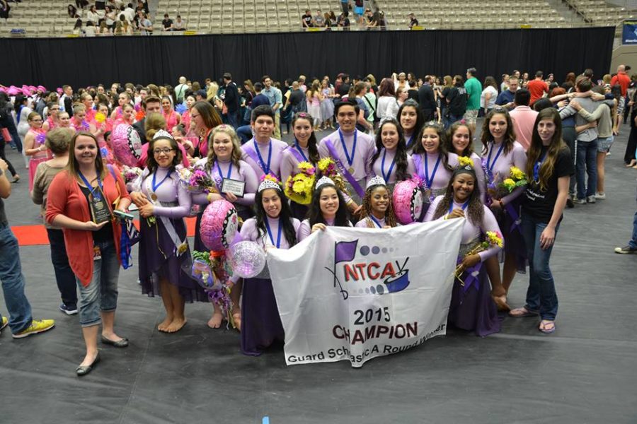 Varsity Winter Guard celebrates their NTCA championship win April 11. Photo from Facebook.