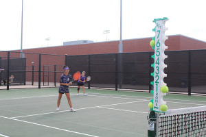 Sophomores Ally Auger and Caitlin Souvannavong lead during a match against Birdville Sept. 15. Photo by Darany Vannithone