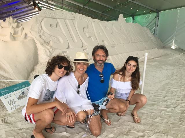 Justine with her parents and young brother. Picture taken in Florida during the sugar sand contest.