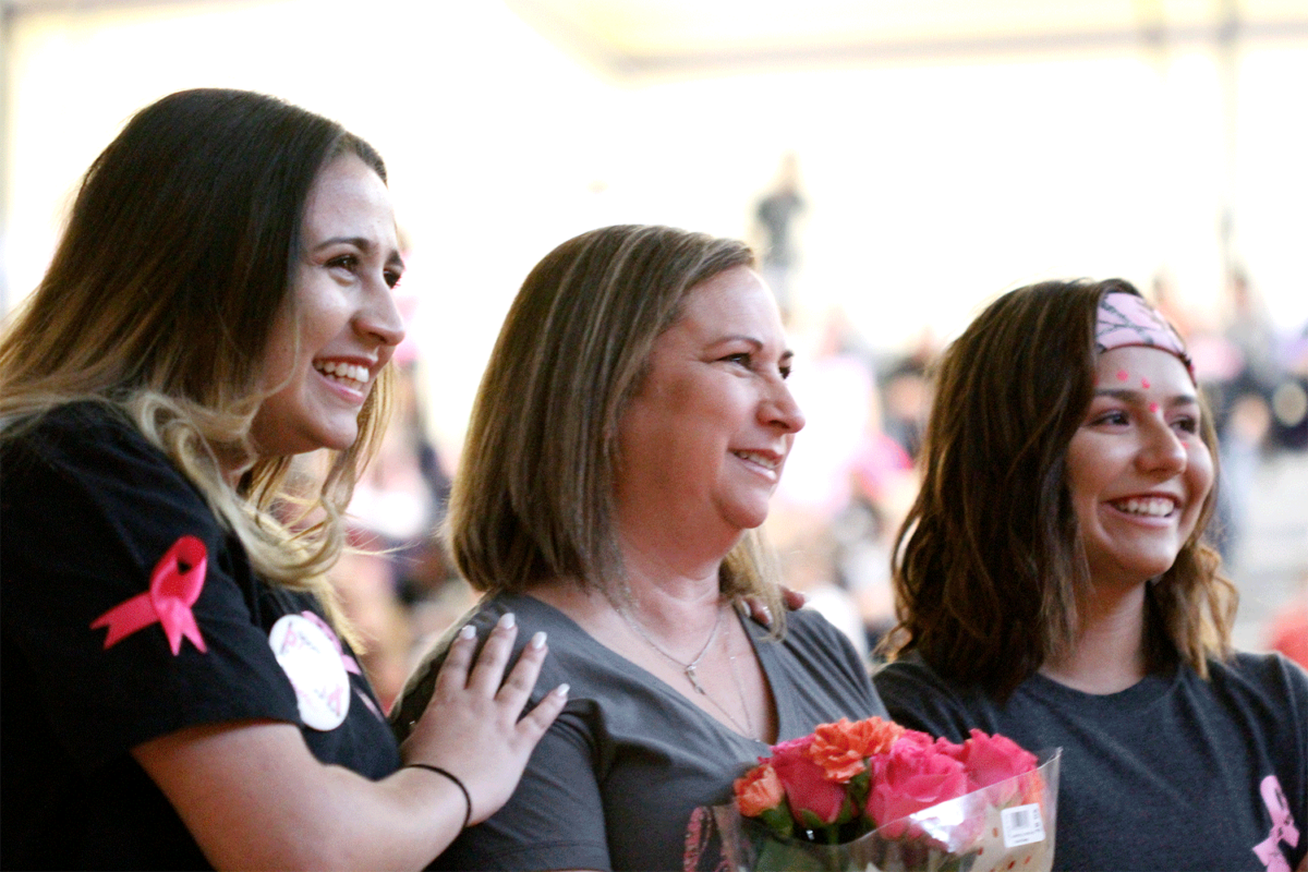 Junior Analis Gonzalez paying tribute to her mothers cancer battle at the pink out pep rally.