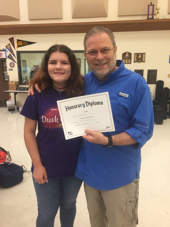 Director John Canfield and senior Natalie Sustek. Photo courtesy; Ranger Regiment twitter. 