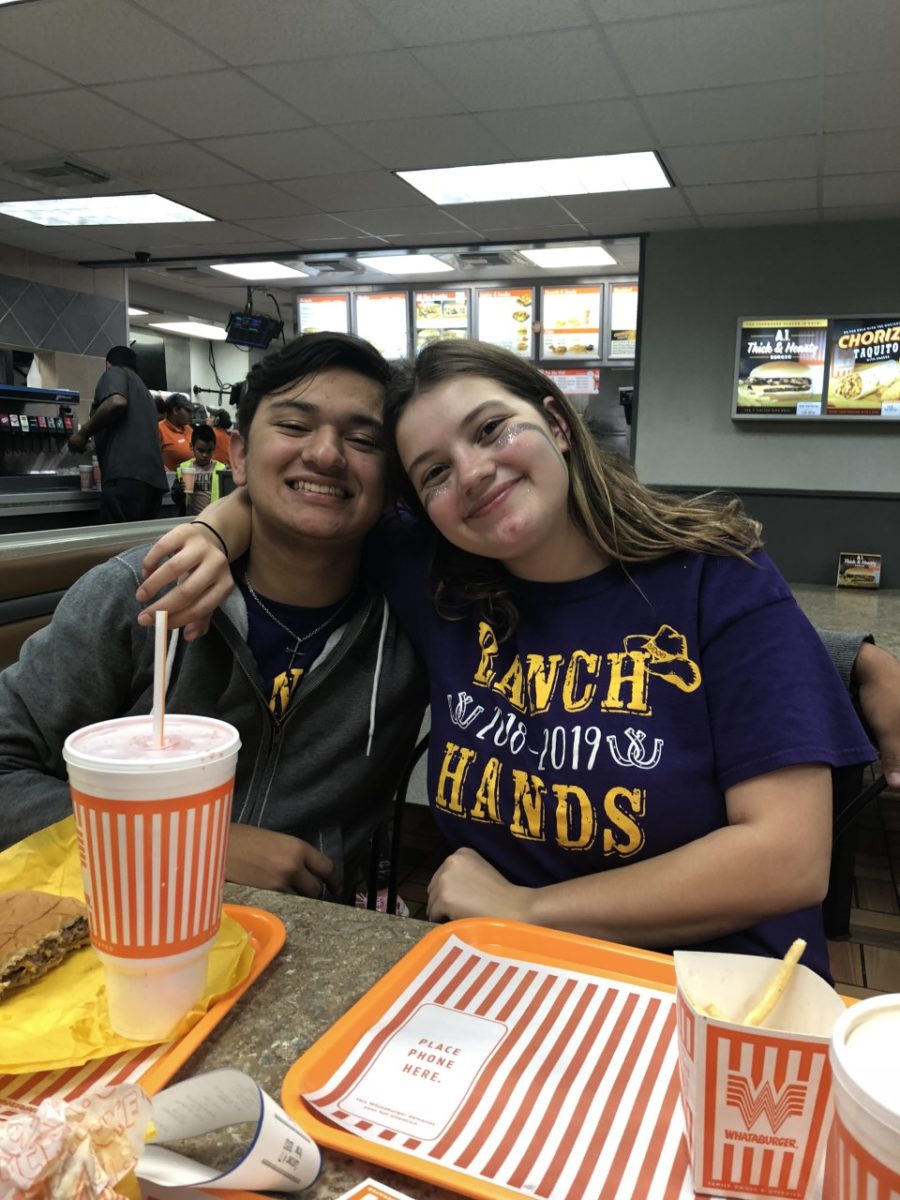 Xavier Wood and Tori Carroll at Whataburger after a game. 