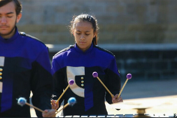 Sophomore, Anahi Diazdeleon plays the xylophone during a band competition.