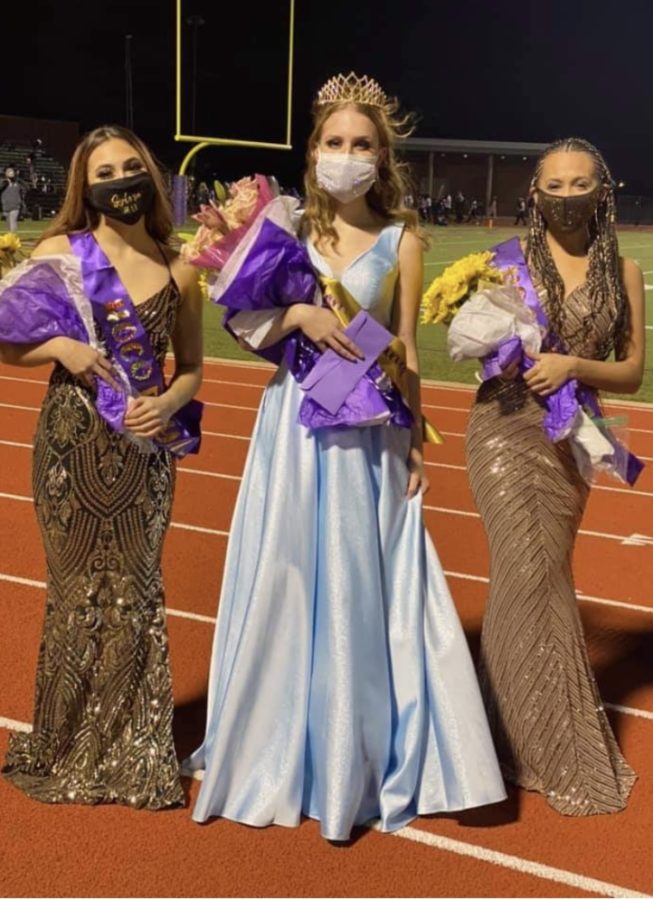 Sophomore Homecoming princess Sylvia Cole, senior homecoming queen Kiley Redd and queen nominee Zari Southward. All three are members of the Charmers.
