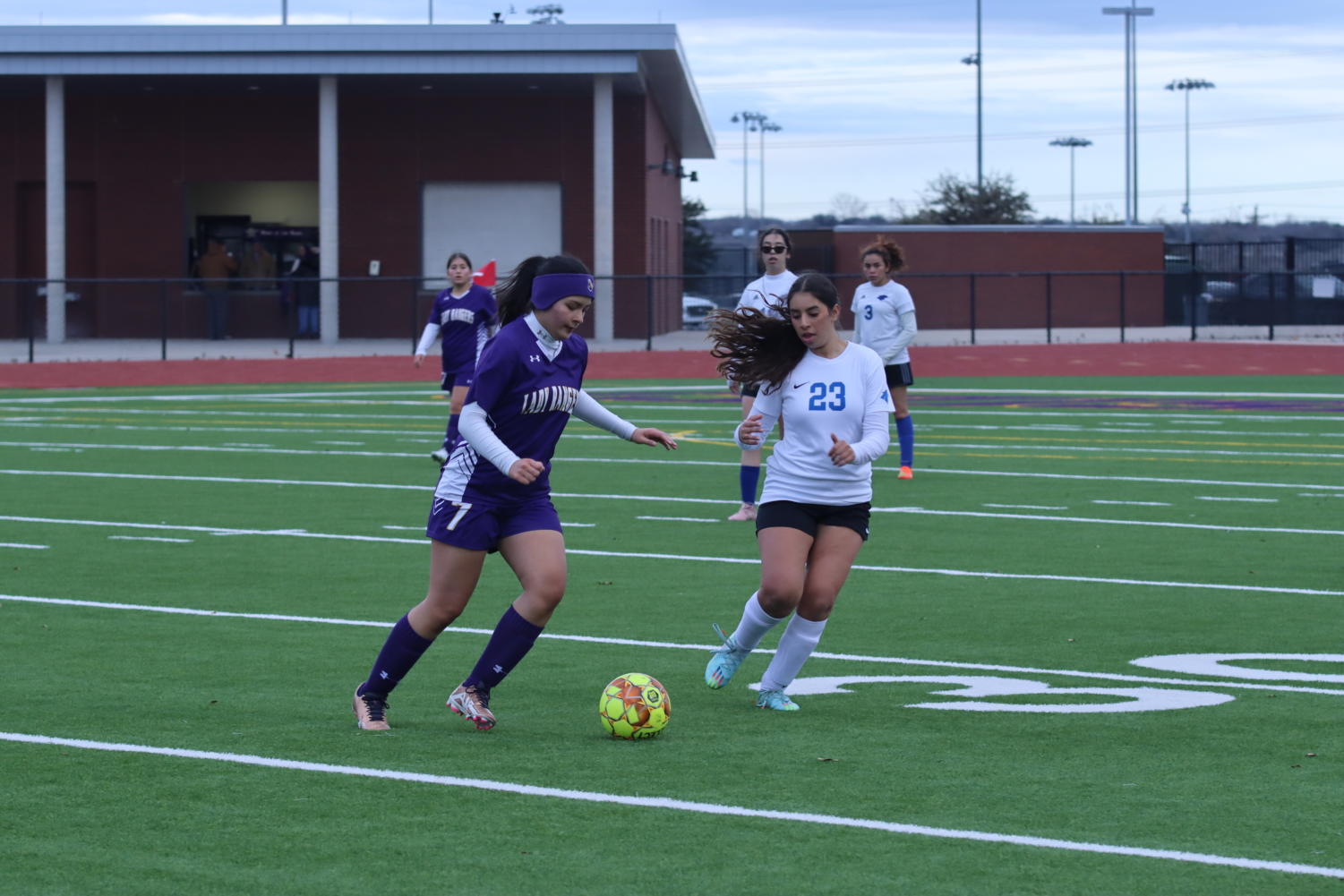 ON THE MOVE During the second half of the game, Marianna Benavente, 9, takes back possession of the ball to pass it to her teammate on Friday, Feb. 10, at the Chisholm Trail field. Photo by Julissa Munoz, 11