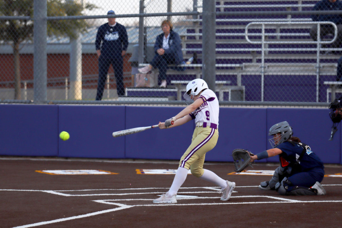 CRACK+OF+THE+BAT+A+split+second+before+she+cracks+the+ball%2C+Makailah+Robinson%2C+9%2C+takes+a+step+to+send+the+softball+toward+the+outfield+on+Friday%2C+March+10.+Photo+by+Daylin+Mitchell-Cochran%2C+12